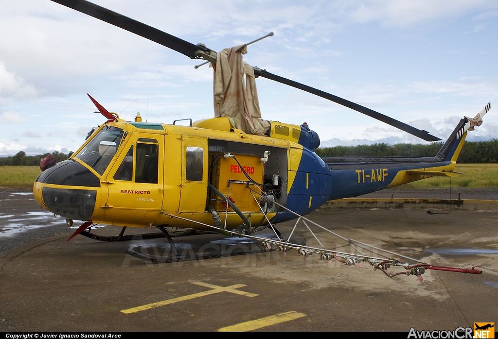 TI-AWF - Bell 212 - Fumi Sibu